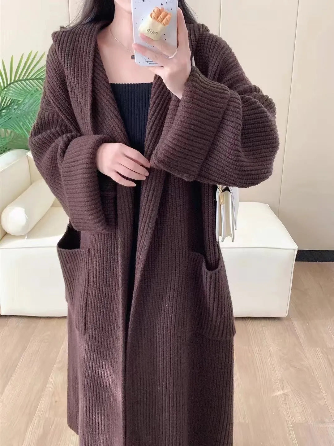 Women's loose hooded cardigan coat in acrylic fibre with extended length and raglan sleeves