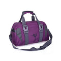 Nylon yoga and gym holdall bag in black, shown in medium and large sizes with carry handle.