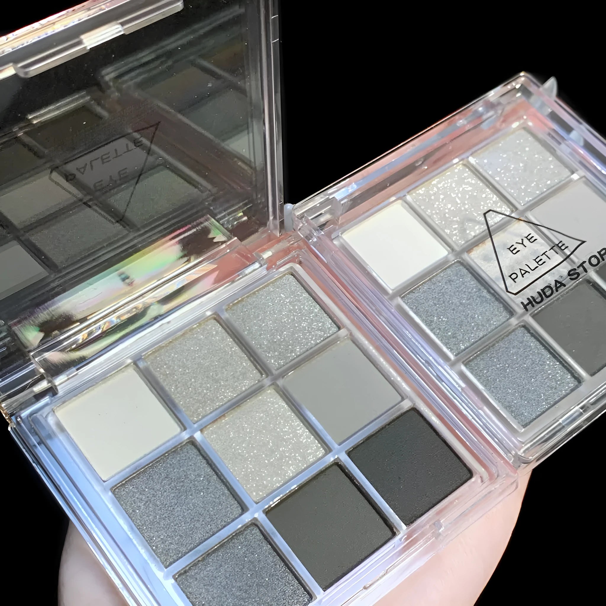 Smoked nine-colour eye shadow palette showing white, silver, black, and iron grey shades in CZ0069-9 compact