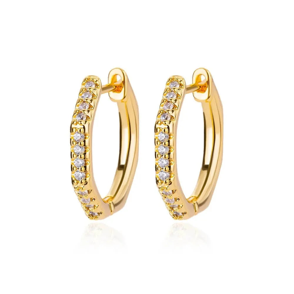 Geometric butterfly-shaped earrings with heart, bow, and star details in copper with a diamond-cut finish.