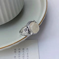 Adjustable copper vintage ring with U-shaped open mouth design and imitation white chalcedony stone