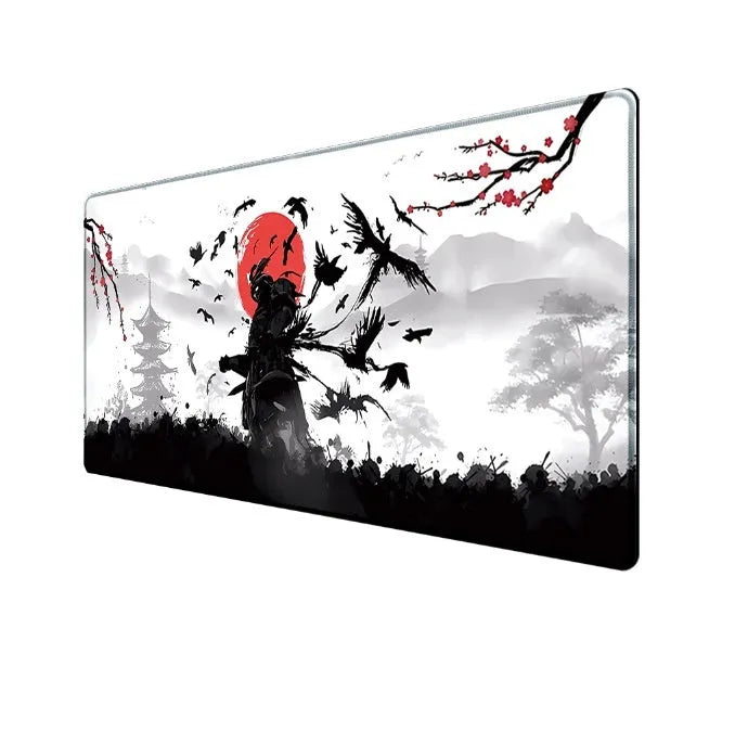 Japanese Samurai design cloth gaming mouse pad with non-slip base on a desk.