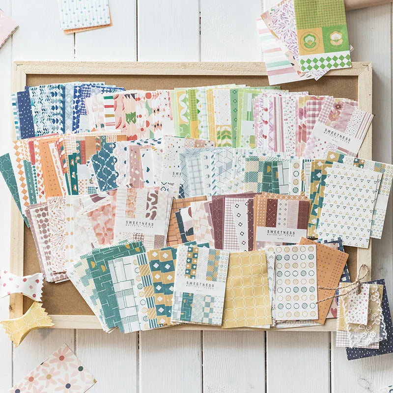 Retro collage note paper in ten pastel colours, each sheet 56mm by 83mm.
