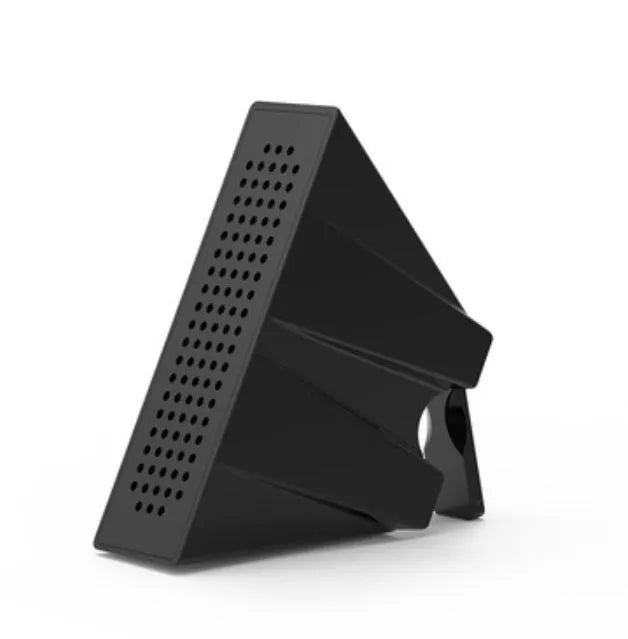 Portable Apple-compatible phone amplifier bracket in multiple colours on desktop