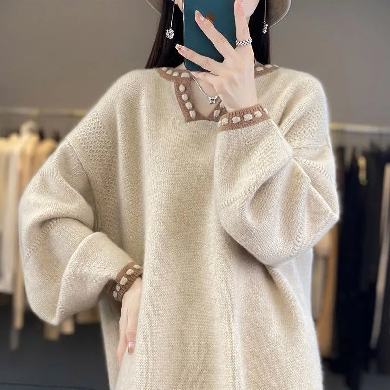 Women's white V-neck viscose sweater with long sleeves on hanger