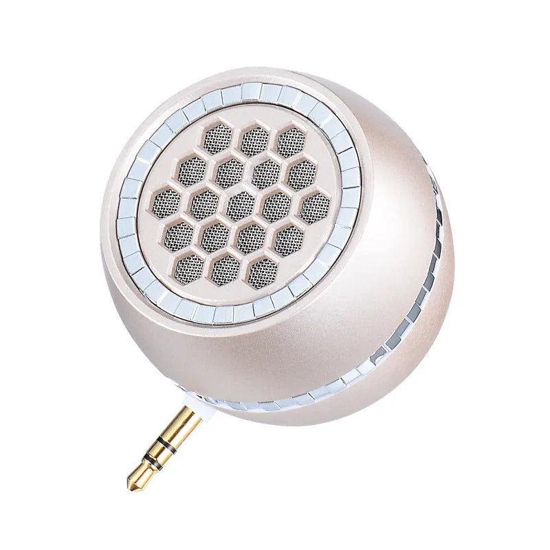 Universal external amplifier speaker in black, gold, or rose gold, showing input for 5V charger.