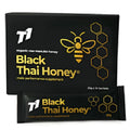 Jar of T1 Black Thai Honey with dark colour visible through glass