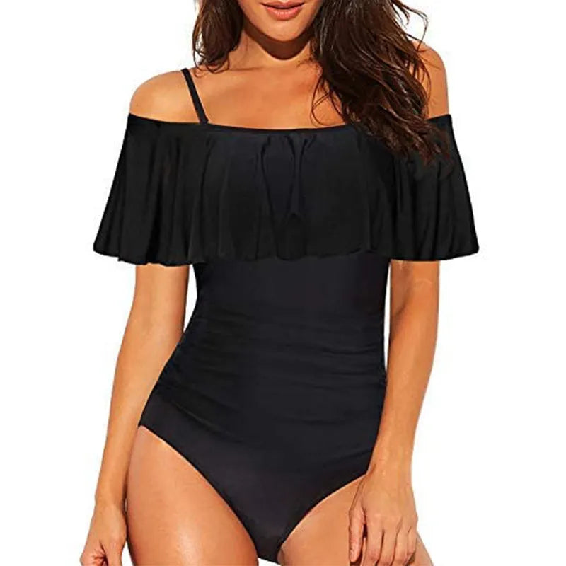 Black one-piece swimsuit with cut-out design and ruffled tube top style straps