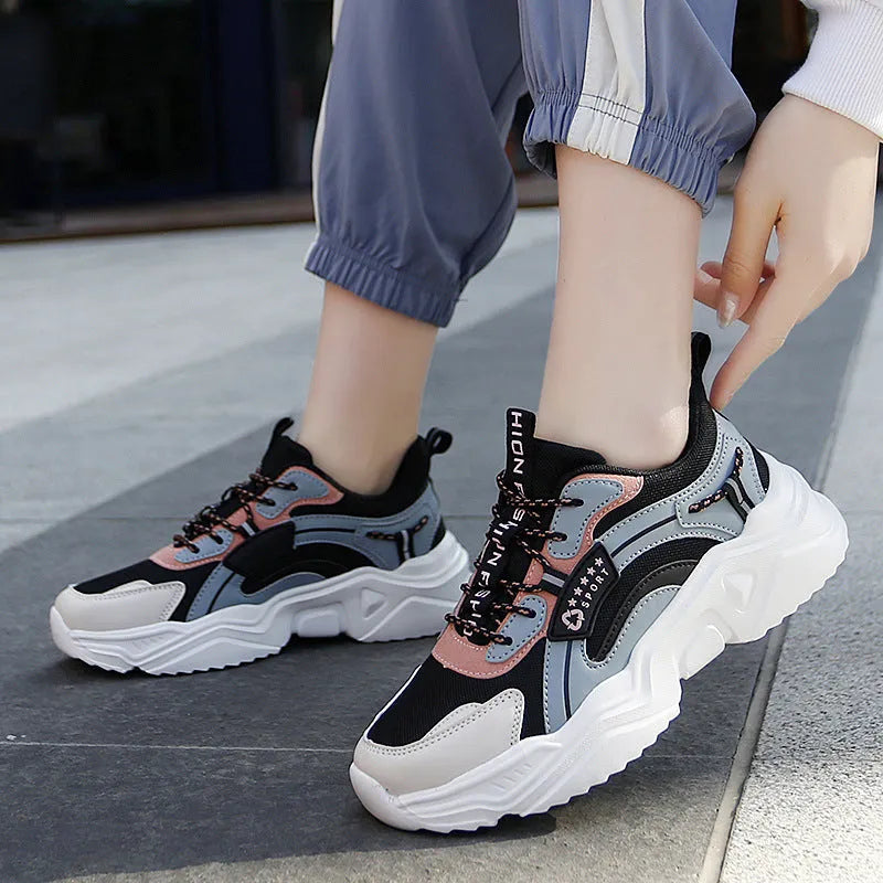 Women's white mesh casual sports shoes with round toe and buckle detail