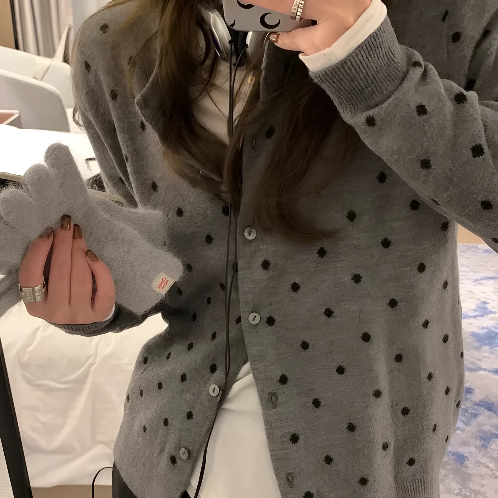 Women's grey dot knit viscose cardigan with crocheted flower details and long sleeves