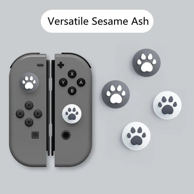 Four silicone rocker caps for Nintendo consoles in various colour combinations