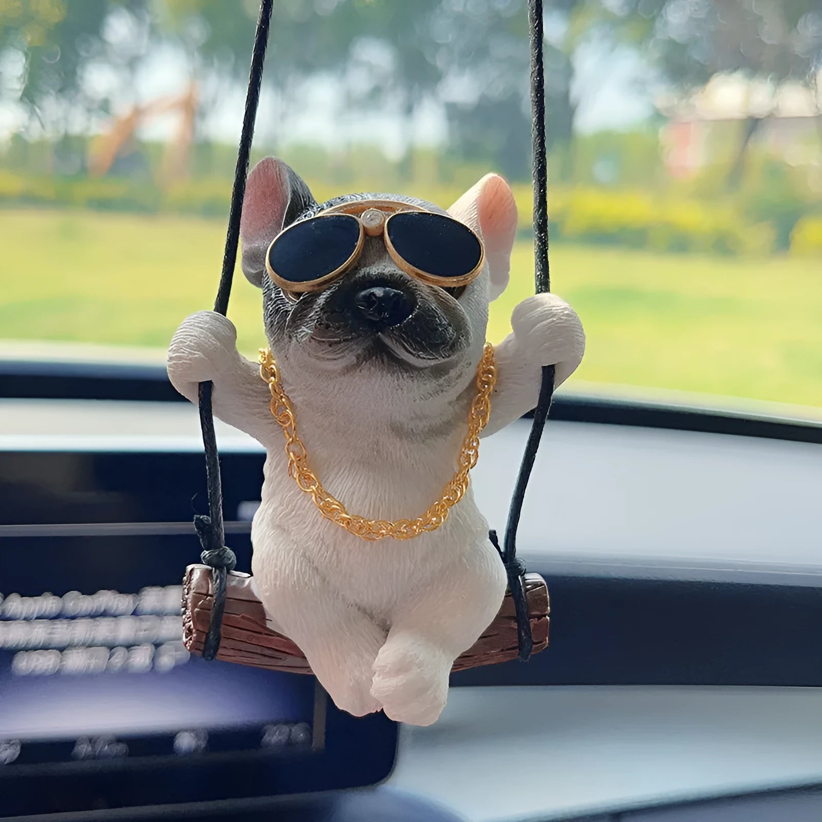 Resin bulldog car pendant hanging ornament in cartoon style for rearview mirror.