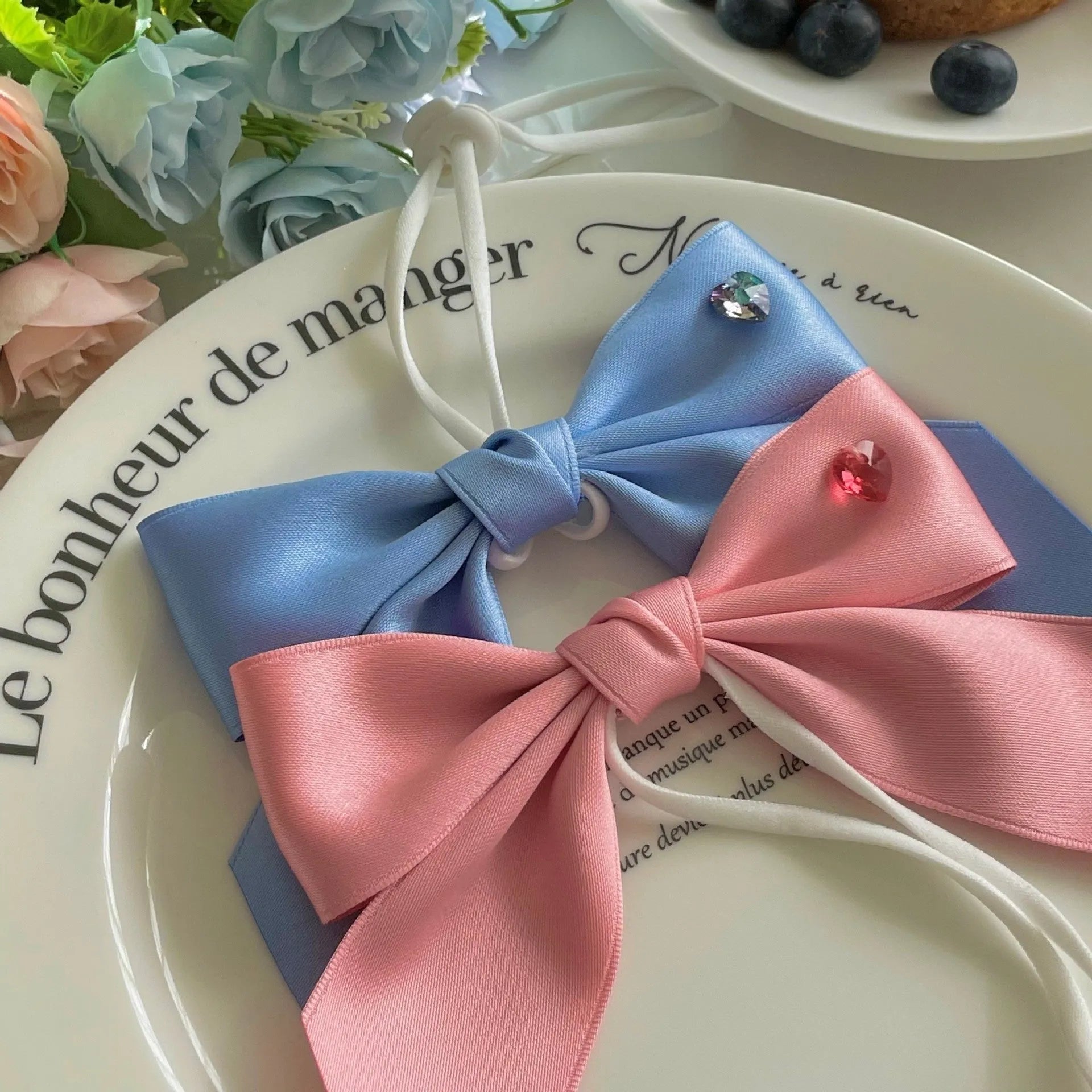 Princess style dog hair band with adjustable bow on canine model, showing polyester cotton jacquard construction