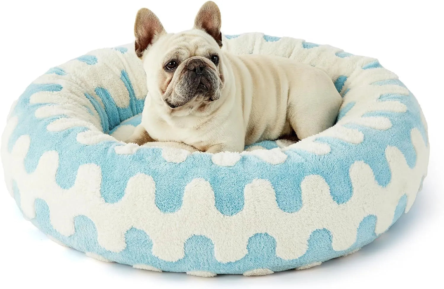 Round blue and white plaid dog bed with a removable cover on a plastic base.