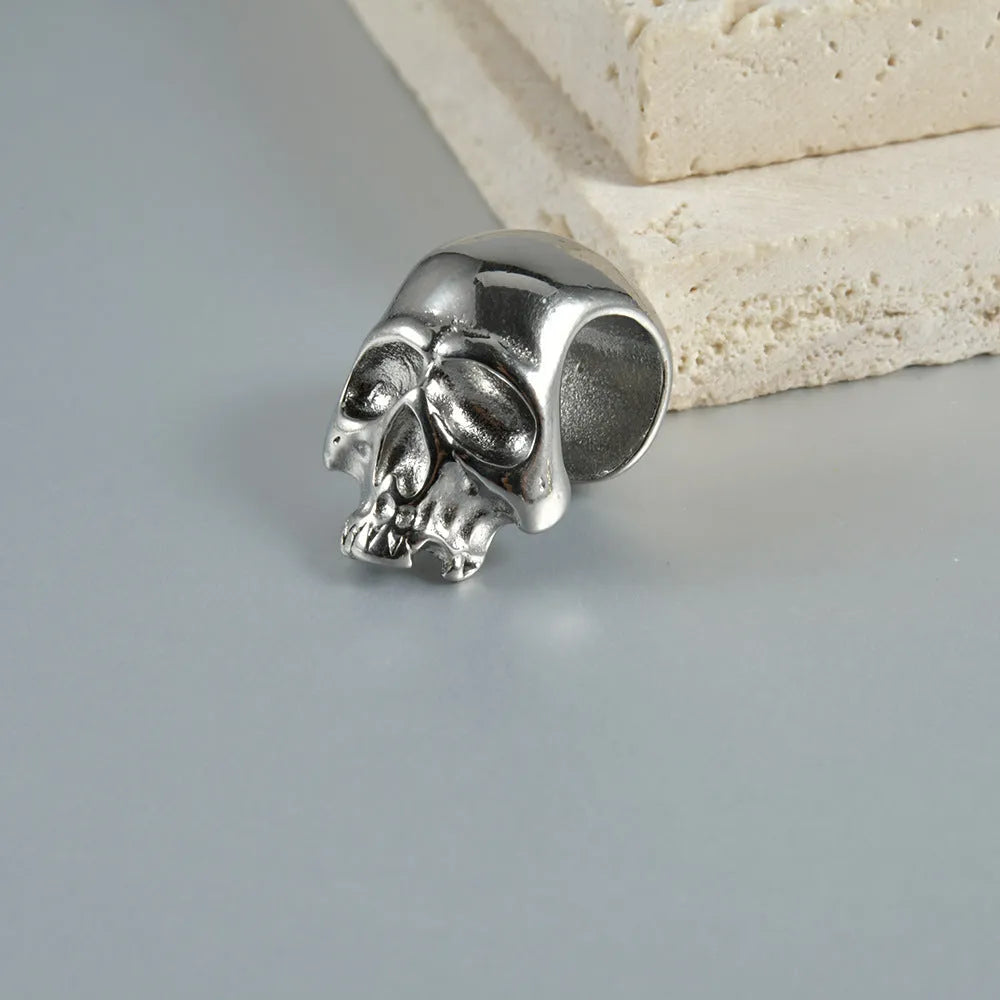 Stainless steel hollow skull Buddha earrings with geometric hip hop design in electroplated finishes