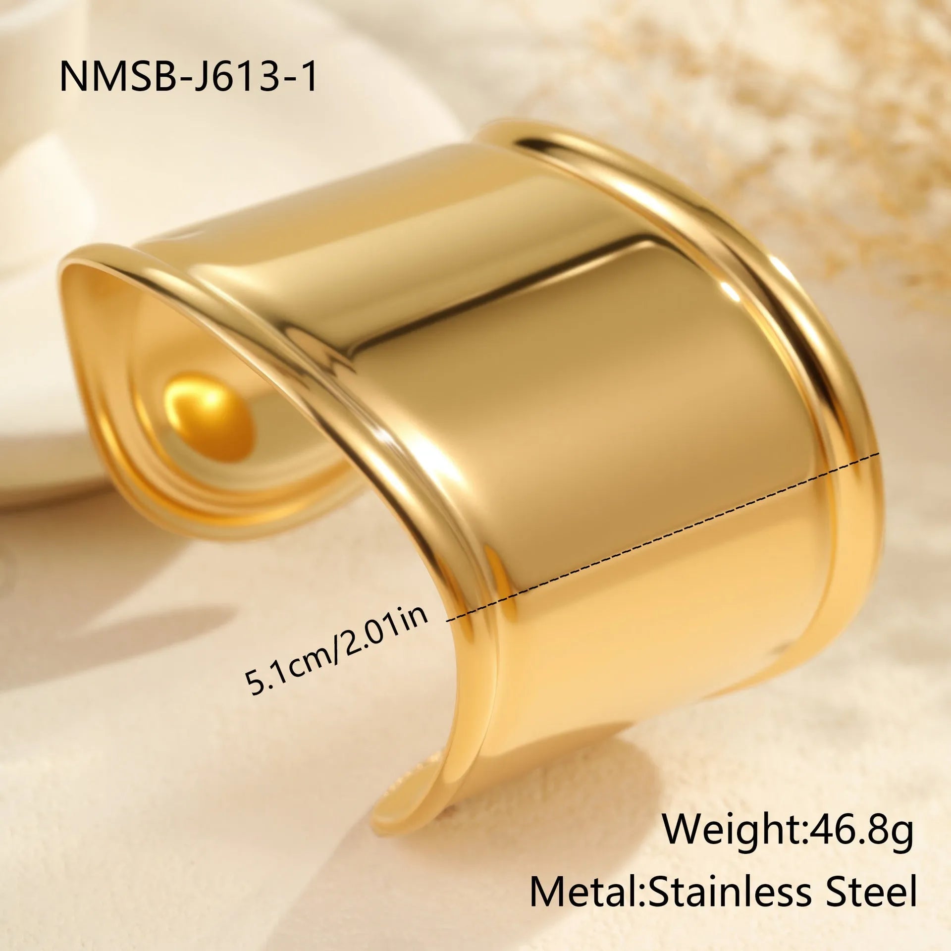 Women's exaggerated wide stainless steel bracelet with geometric wave design and niche opening in gold finish