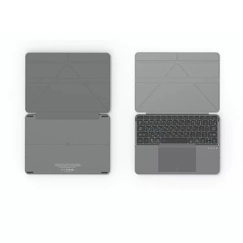 Grey folding Bluetooth keyboard for phablet and tablet devices showing compact folded position