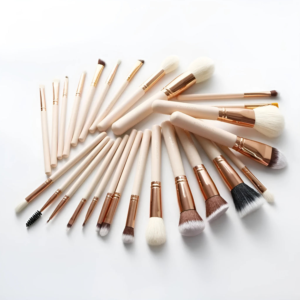 26 pink-handled makeup brushes with wool bristles in a rolled-up PU case