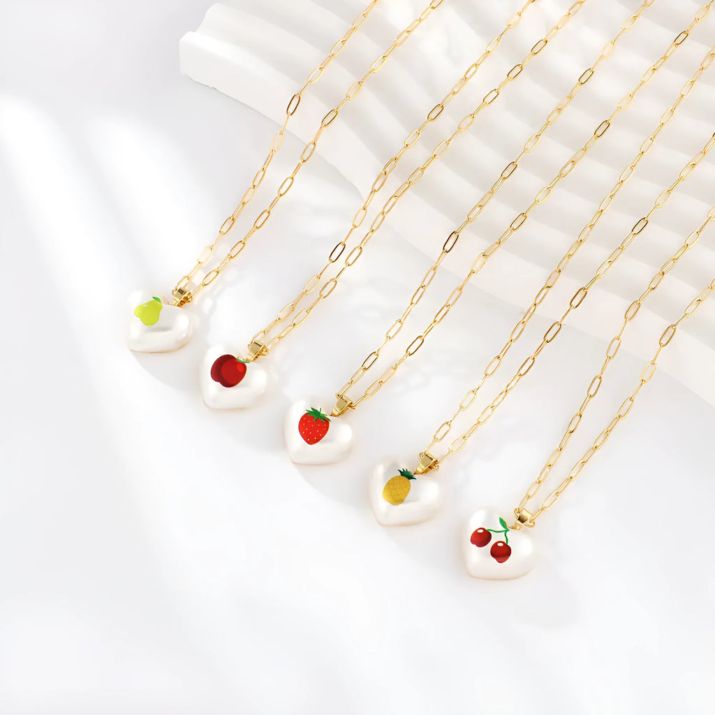 Heart-shaped necklace with a choice of fruit pendant charms on an adjustable chain.