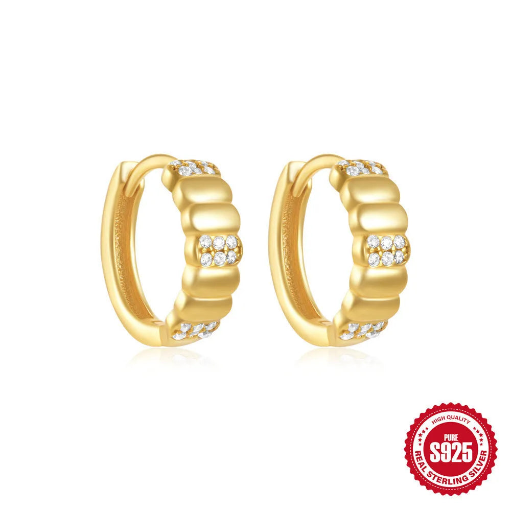 Sterling silver geometric stud earrings with small round designs in gold or silver electroplated finishes