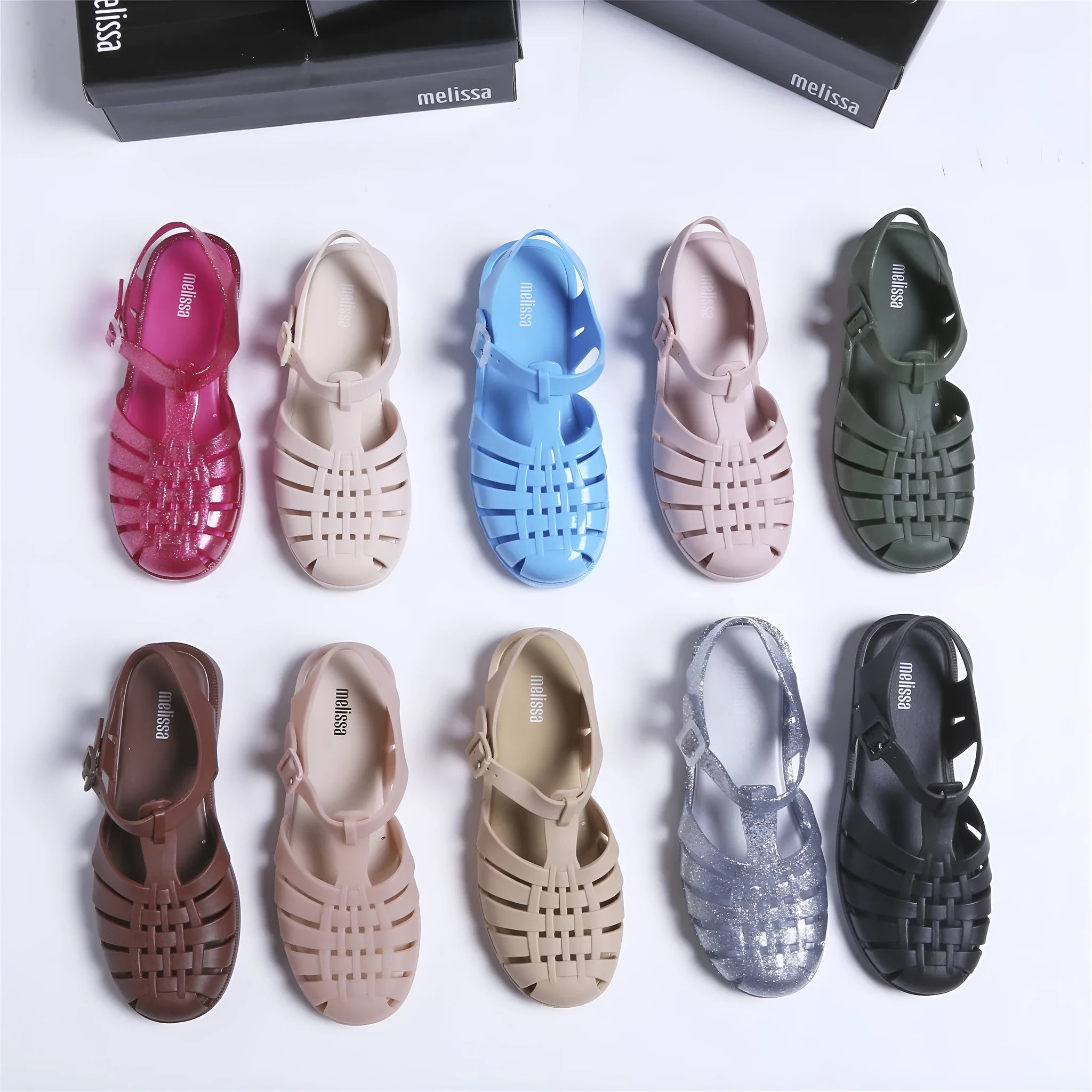 Vintage weave Roman sandals in PVC with buckle fastener, shown in a choice of ten colours.
