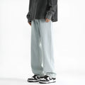 Men's light blue washed straight leg cotton jeans with button waist fastening