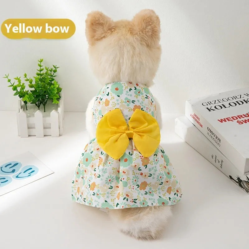 Orange bow floral butterfly knot ultra-thin polyester dress on a small dog.
