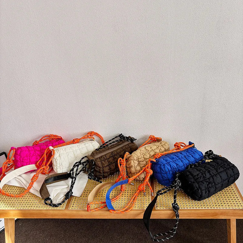 Women's soft nylon pillow crossbody messenger bag with rhombus pattern and zippered pocket.