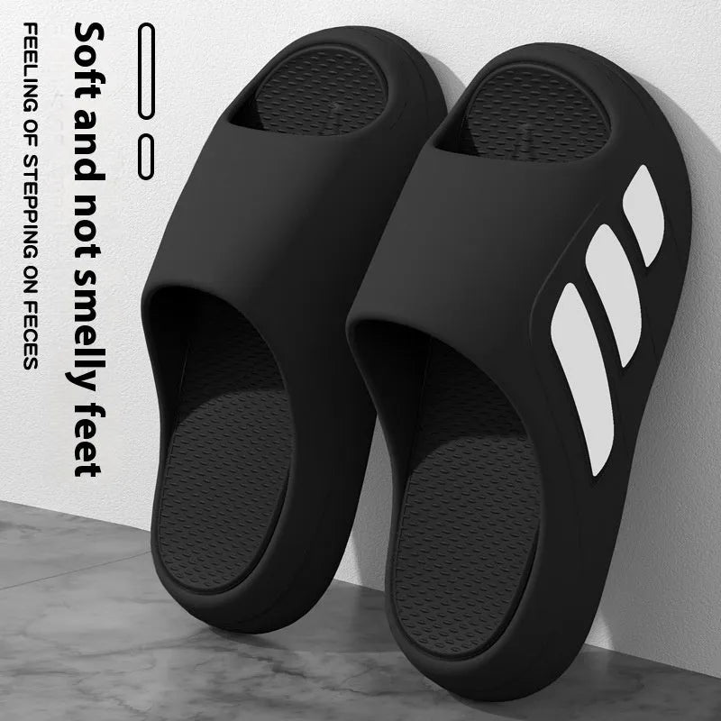 Brown unisex EVA platform flip flops with a thick sole and letter detailing for indoor use.