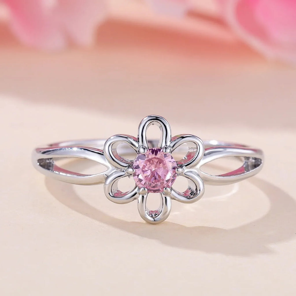 Lady's hollowed floral fashion ring in electroplated copper, platinum pink diamond colour.