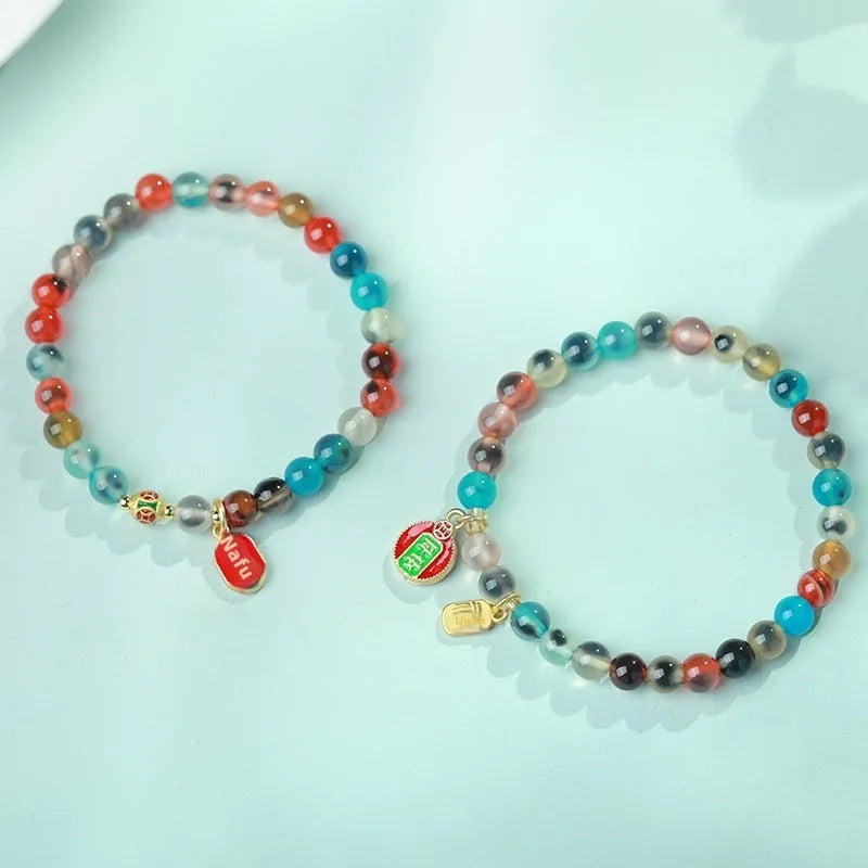 Natural agate women's bracelet with colourful sugar heart designs and geometric snake chain closure