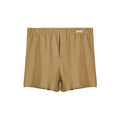 Men's loose-fitting cotton boxer shorts in a solid colour, shown in a light grey shade on a mid waist.