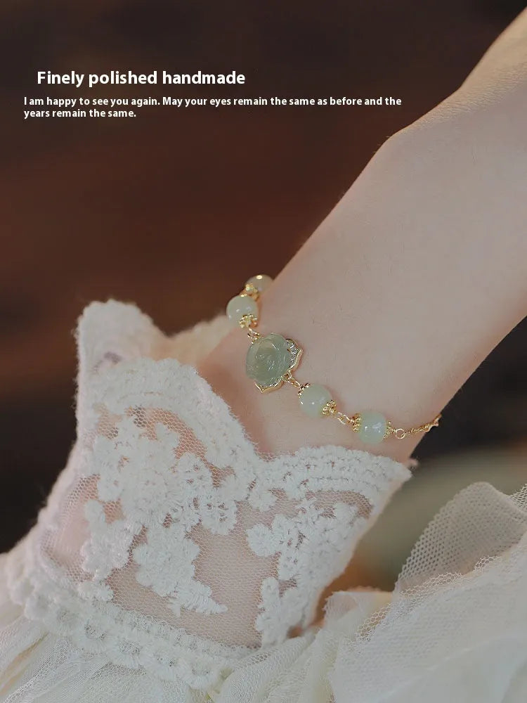 Women's Hetian jade bracelet with rose flower design and 14K gold plating