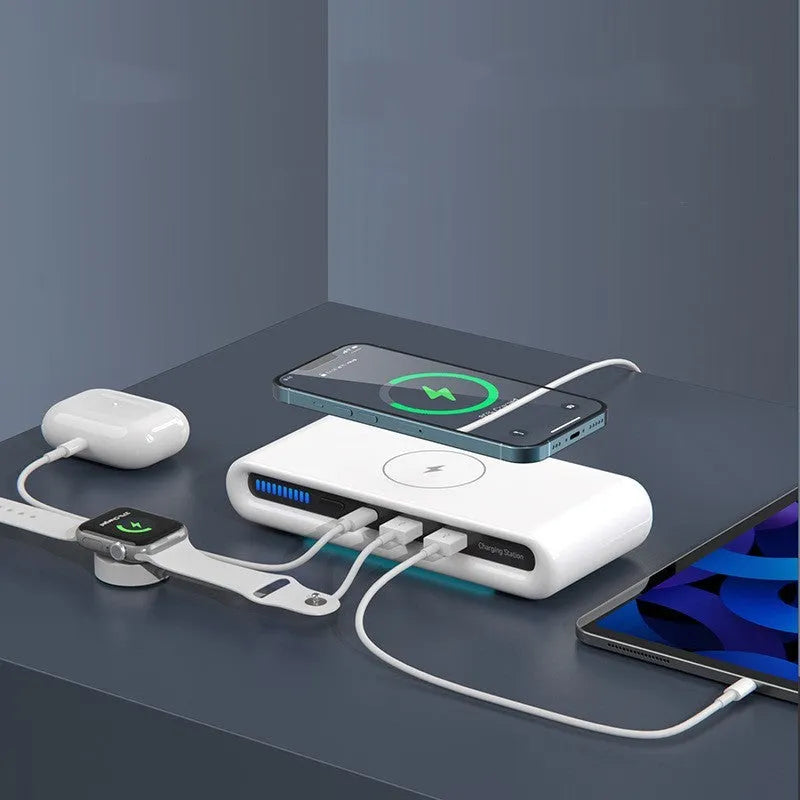 White 15W desktop wireless charger with eight colour ambient lighting modes showing phone charging