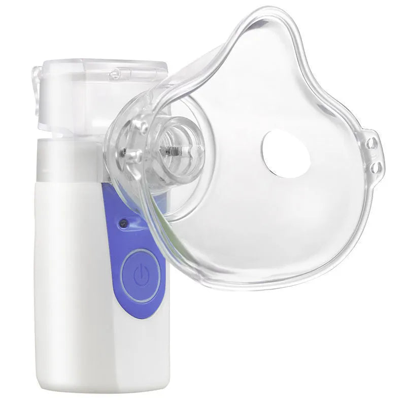 White plastic handheld nebuliser spray machine with USB charging port and single mist outlet