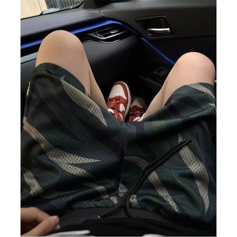 Men's straight leg camouflage mesh shorts in cotton-polyester blend fabric