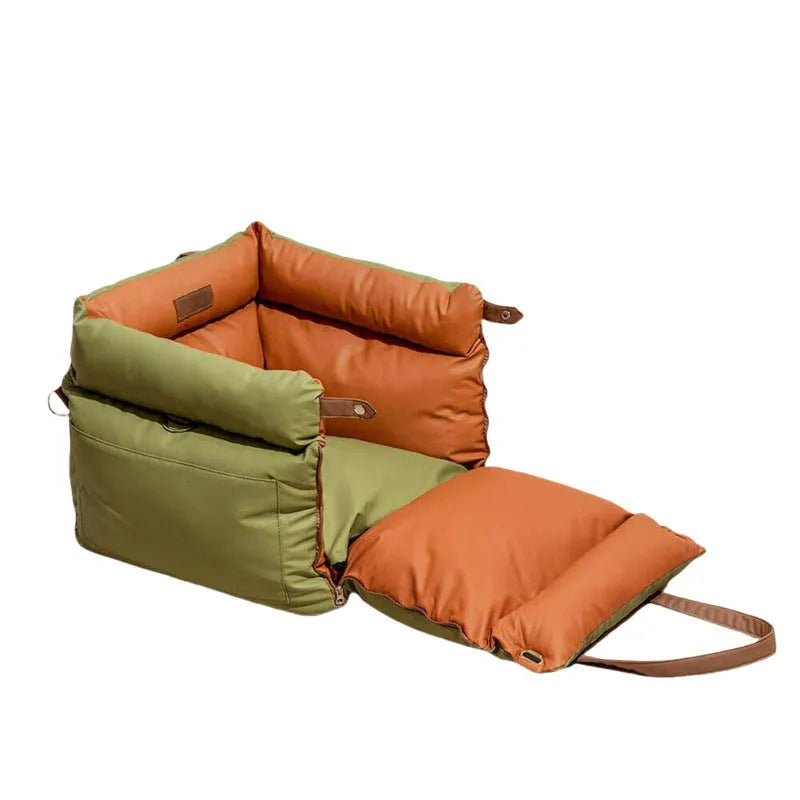 Green waterproof dog car nest with removable washable cover on a car seat