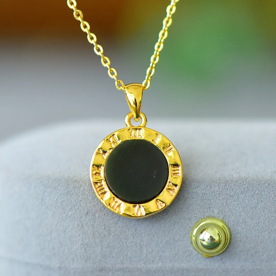Flat grey Hetian jade pendant with copper wire inlay decoration and ink blue jade accents on a necklace.