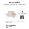 Camping lantern with wine bottle shade design in beige colour showing USB-C charging port