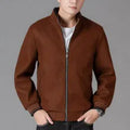 Men's grey zip-up fleece jacket with a stick pocket, shown in a sports style.
