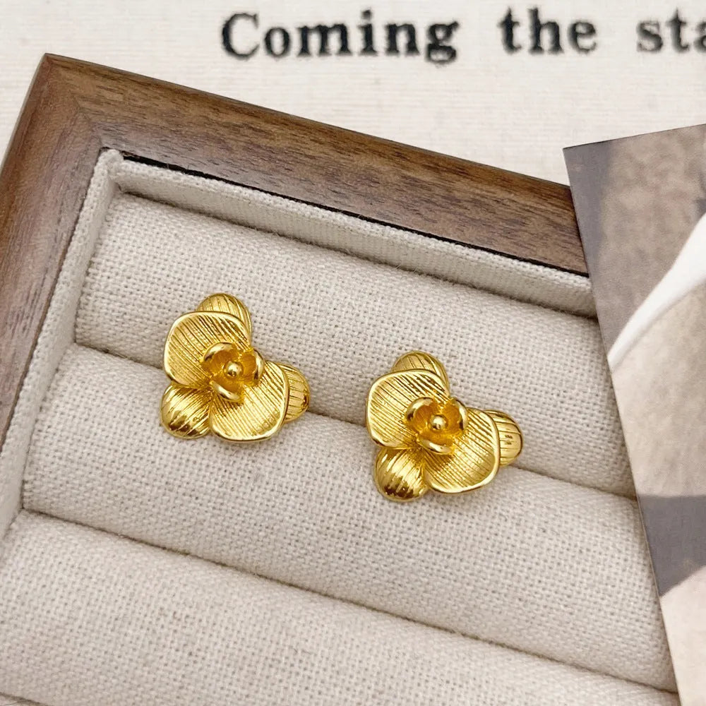 Retro floral copper earrings for women in gold and silver tone options