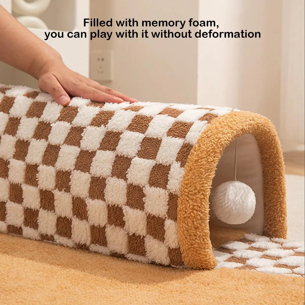 Coffee-coloured plush pet bed with integrated tunnel and anti-slip base for dogs and cats