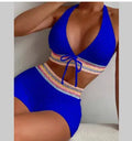 Women's solid colour polyester two-piece bikini swimsuit shown in blue.