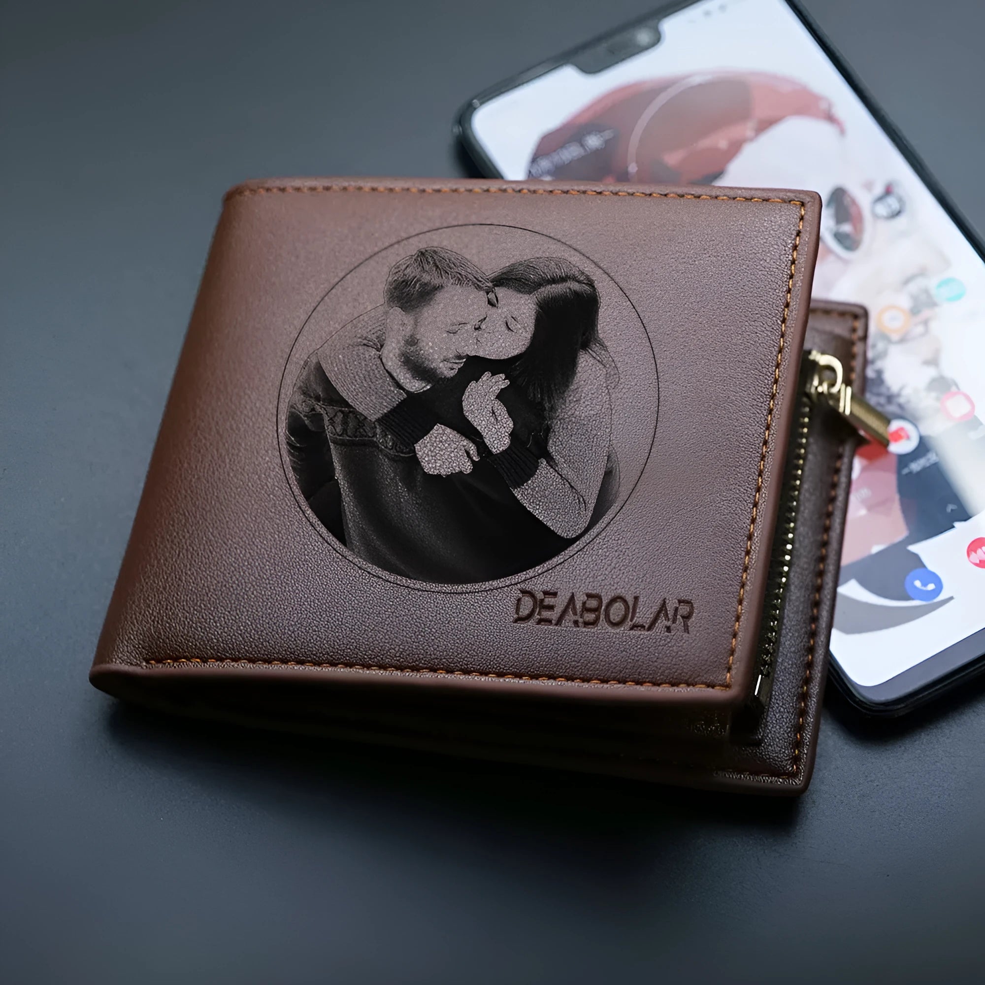 Men's brown leather wallet with a silver zipper closure laid flat.