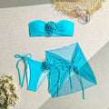 Women's tube top swimsuit with 3D flower detail in blue, pink, or purple colours