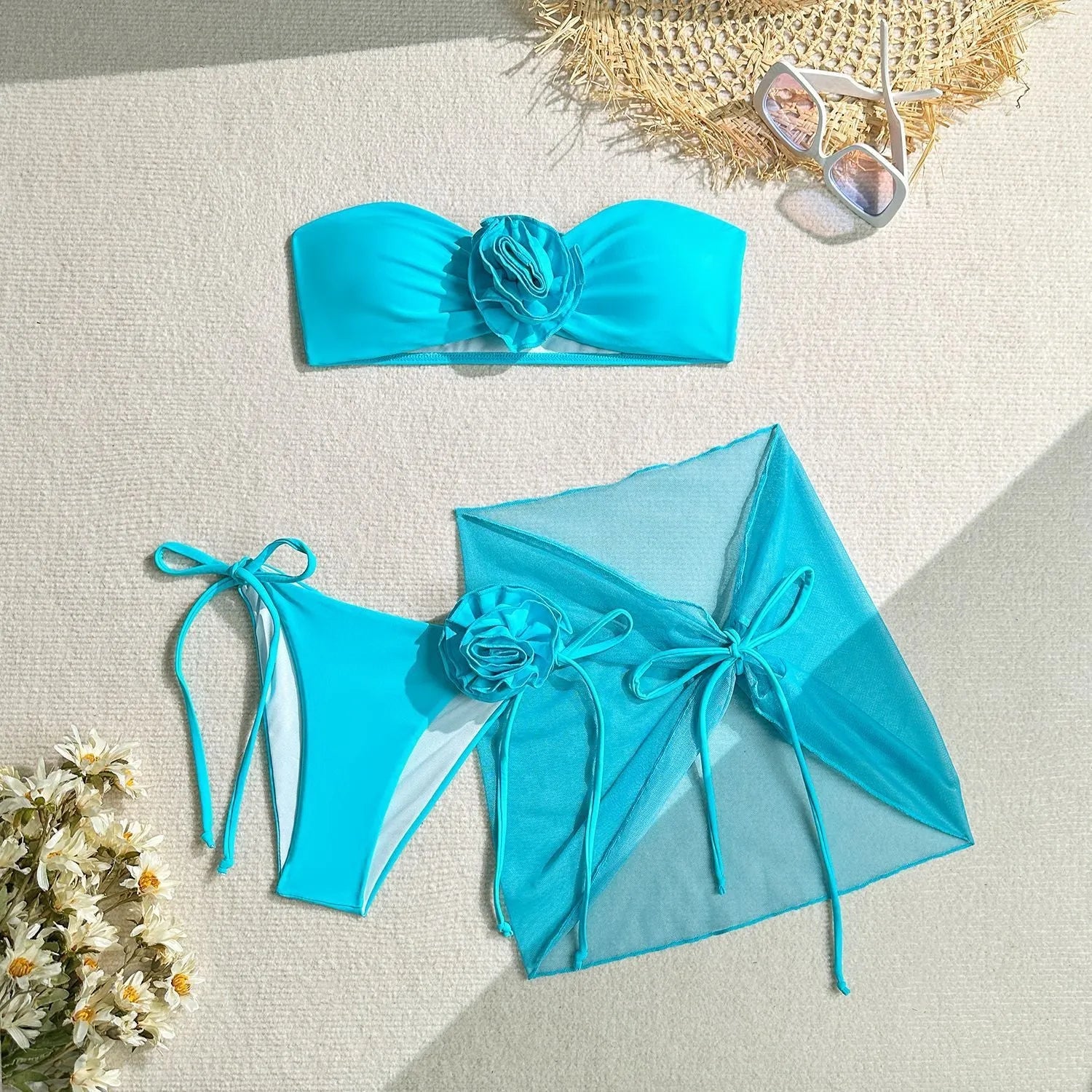 Women's tube top swimsuit with 3D flower detail in blue, pink, or purple colours