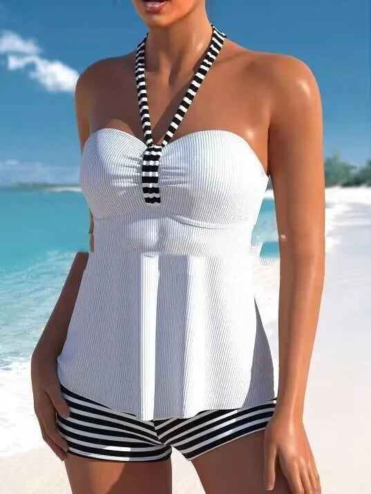 Women's off-shoulder swimsuit with solid colour body and black and white stripes in briefs style