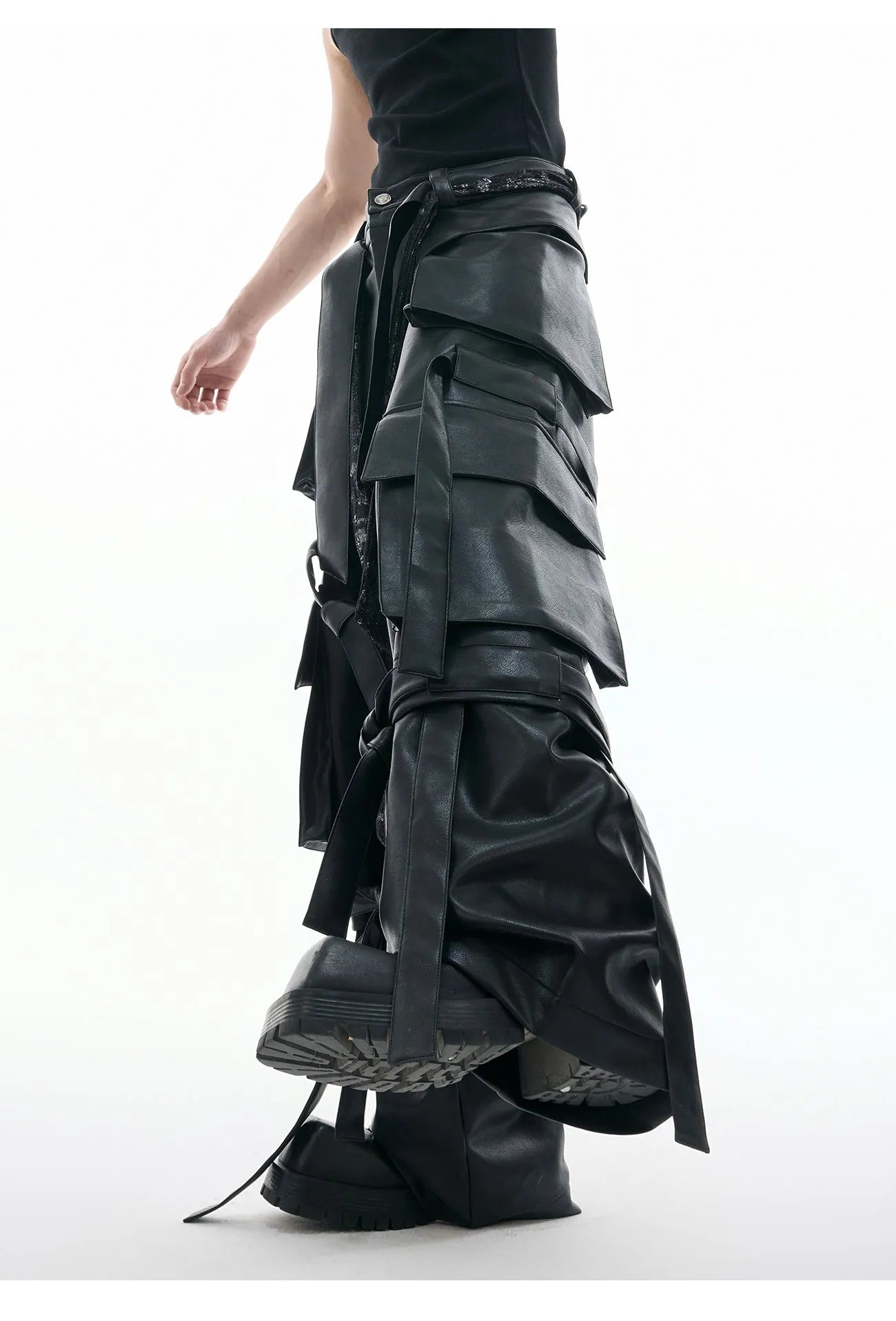 Black quilted leather pants with multiple pockets and loose-fit retro streetwear design