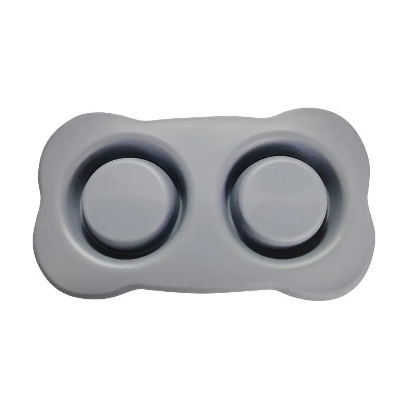 Large elevated silicone dog bowl with stainless steel insert in choice of colours on a kitchen floor.
