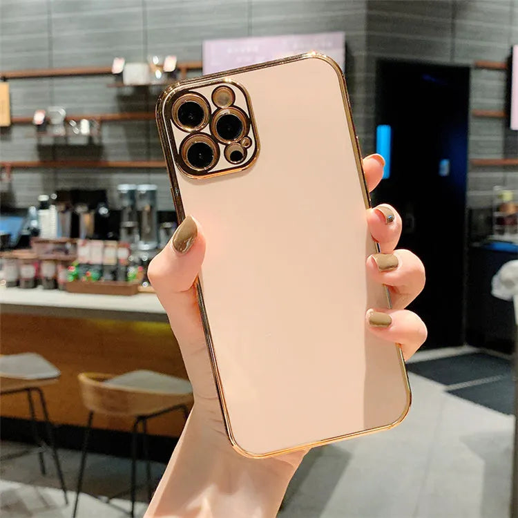 Gold plated iPhone case with silicone stripes in solid colour on an iPhone
